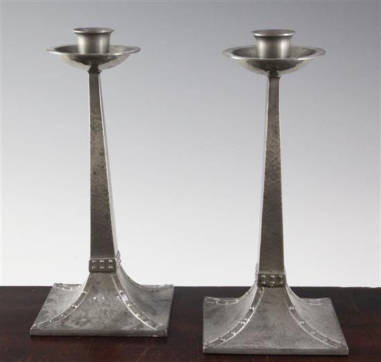 A pair of James Dixon & Sons planished pewter candlesticks, 8.75in.